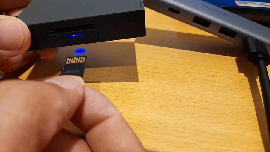 Insert mini SD card into a USB card reader